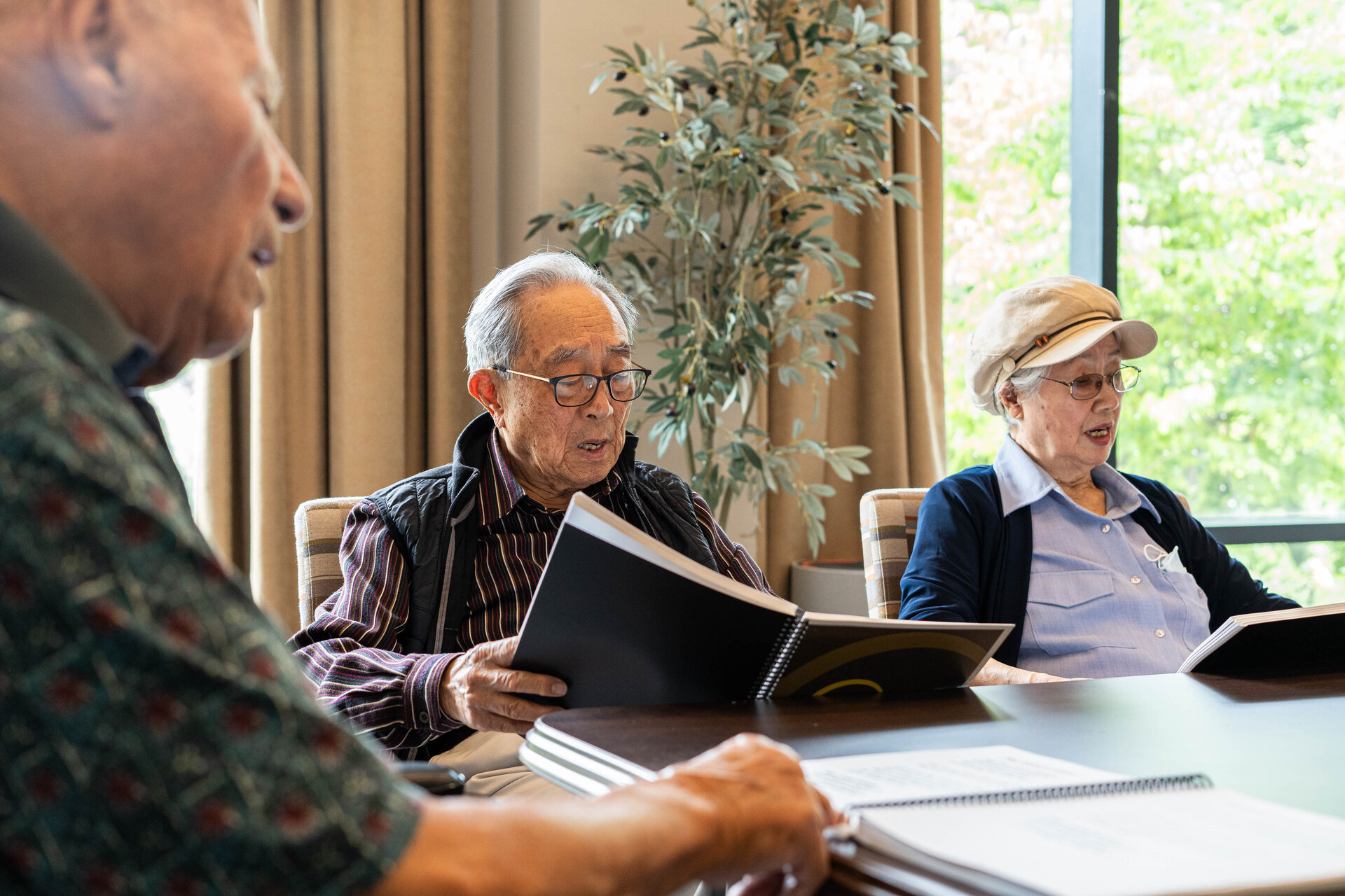 Seniors sitting during a class in a retirement home