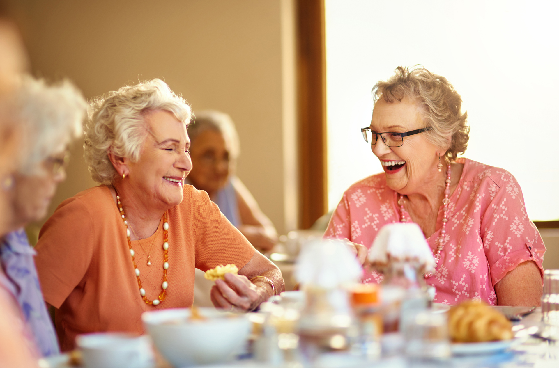 Cropped shot of a group of seniors having tea in their retirement home