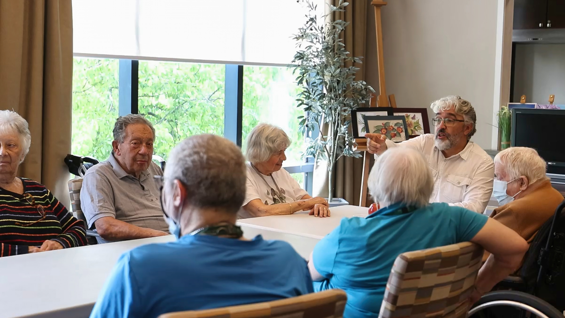 Pastor speaking with residents